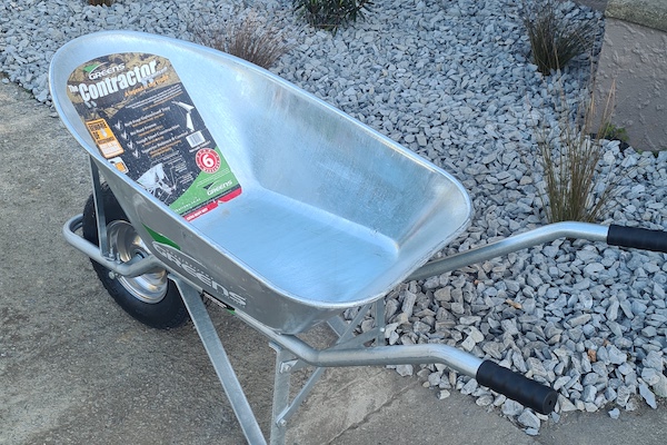 Image of a silver coloured, sturdy wheelbarrow